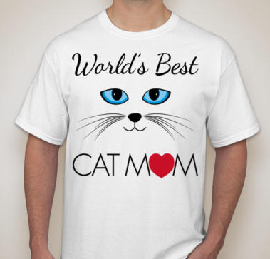 Worlds Best Cat Mom Shirt - White shirt, Cat face with big blue eyes, nose and whisker and the words  World's Best Cat Mom,  the O in the word mom is a big heart,  you can click the picture to go to order form too